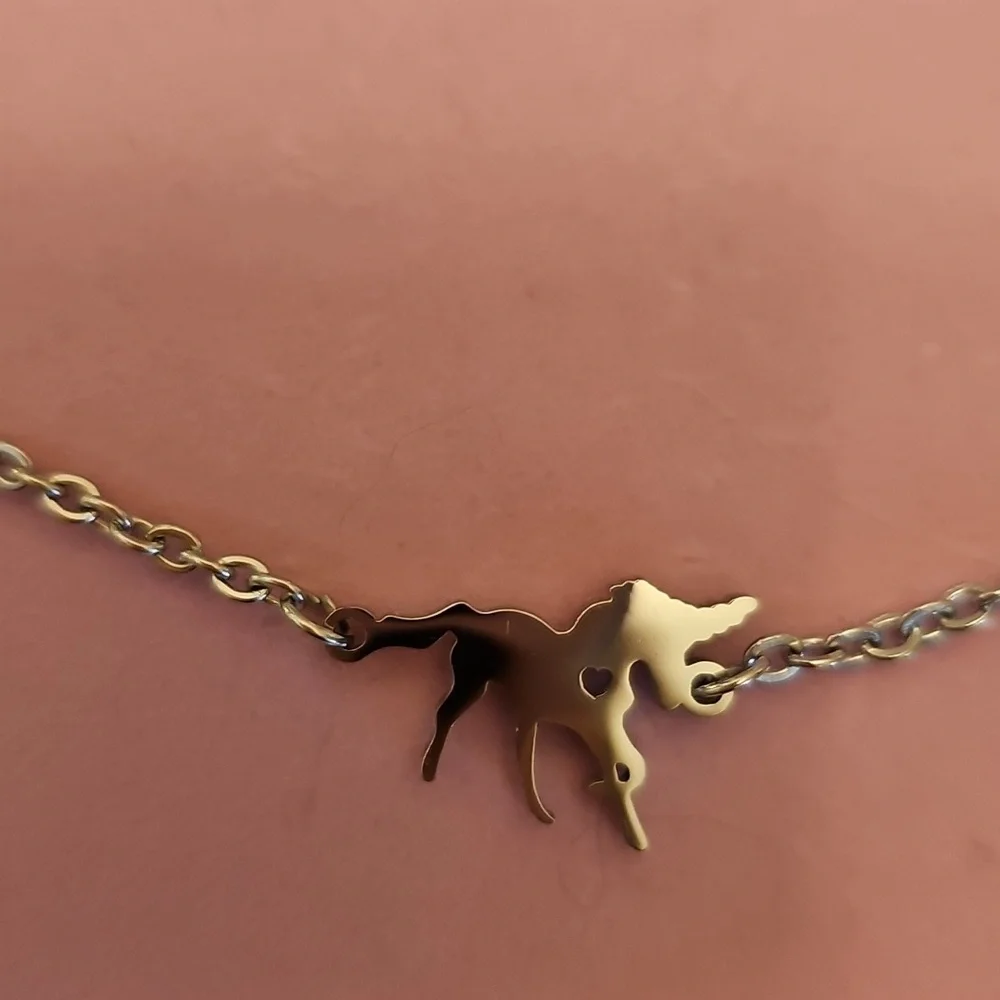 Silver Tone Unicorn Pendant Necklace and Bracelet Set